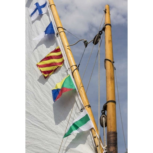 WA, Boat sail and flags at Bainbridge Island
